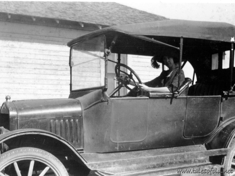 Unknown Woman in an Old Model Car